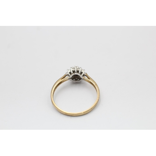 2273 - A hallmarked London 9ct gold diamond starburst set ring, size P - approx. gross weight 1.5 grams