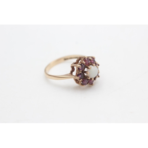 2274 - A hallmarked Birmingham 9ct gold ruby framed opal floral set ring, size M½ - approx. gross weight 3.... 