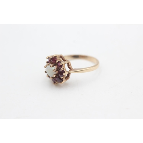 2274 - A hallmarked Birmingham 9ct gold ruby framed opal floral set ring, size M½ - approx. gross weight 3.... 