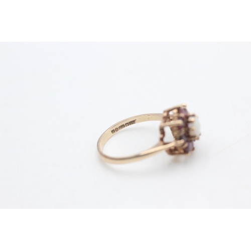 2274 - A hallmarked Birmingham 9ct gold ruby framed opal floral set ring, size M½ - approx. gross weight 3.... 