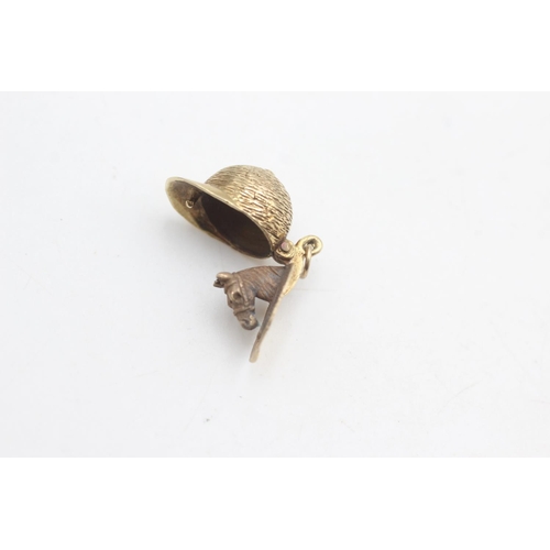 2278 - A hallmarked London 9ct gold jockey cap opening charm with horse head inside - approx. gross weight ... 