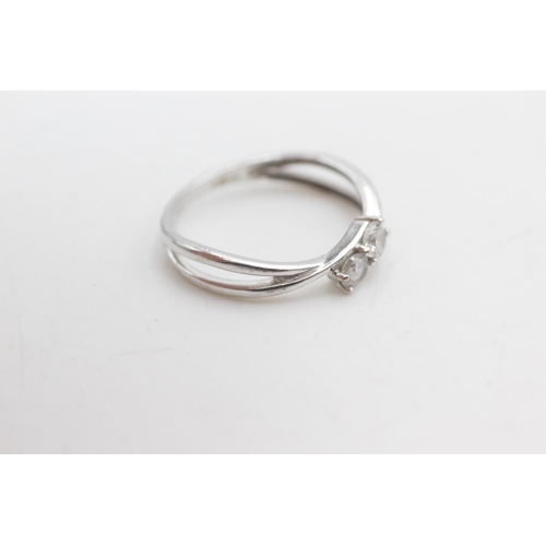 2282 - A 9ct white gold clear gemstone two stone split band dress ring, size P - approx. gross weight 1.9 g... 