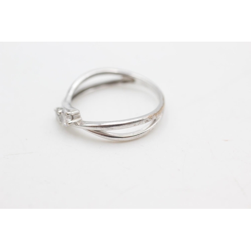 2282 - A 9ct white gold clear gemstone two stone split band dress ring, size P - approx. gross weight 1.9 g... 