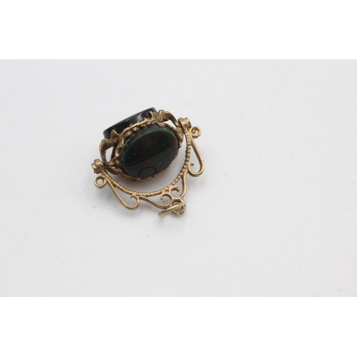 2287 - A 9ct gold carnelian, onyx and bloodstone spinner fob pendant - approx. gross weight 2.3 grams