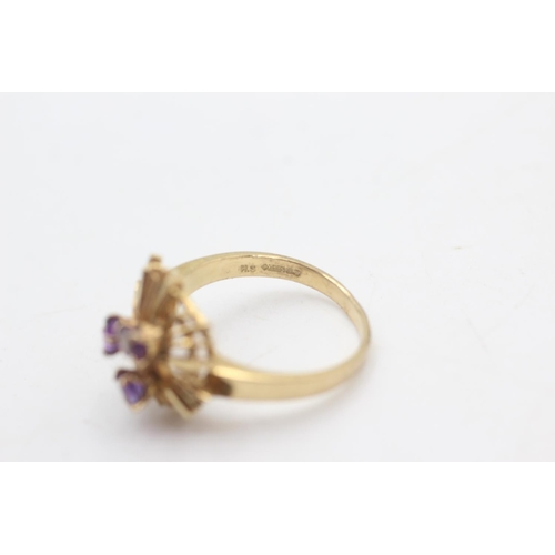 2301 - A 9ct gold three stone amethyst brutalist ring, size N½ - approx. gross weight 3.1 grams