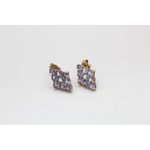 2302 - Two pairs of 9ct yellow and white gold tanzanite and diamond drop earrings - approx. gross weight 3 ... 