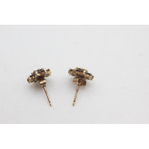 2305 - A pair of 9ct gold sapphire cluster stud earrings - approx. gross weight 1.3 grams