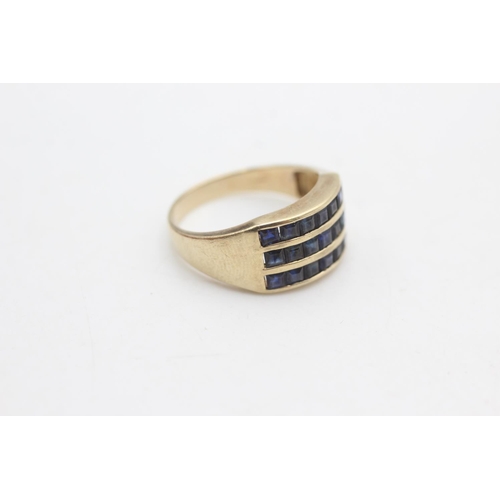 2306 - A 9ct gold three row sapphire fronted band ring, size N - approx. gross weight 3.2 grams