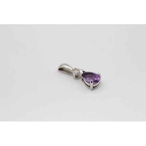 2313 - Three 9ct white gold gemstone pendants, one garnet, one amethyst and one tanzanite - approx. gross w... 