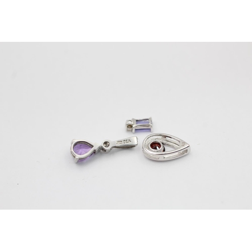 2313 - Three 9ct white gold gemstone pendants, one garnet, one amethyst and one tanzanite - approx. gross w... 