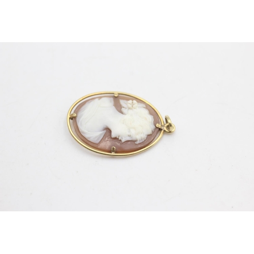 2315 - A 15ct gold framed shell cameo pendant with a female portrait - approx. gross weight 1.6 grams