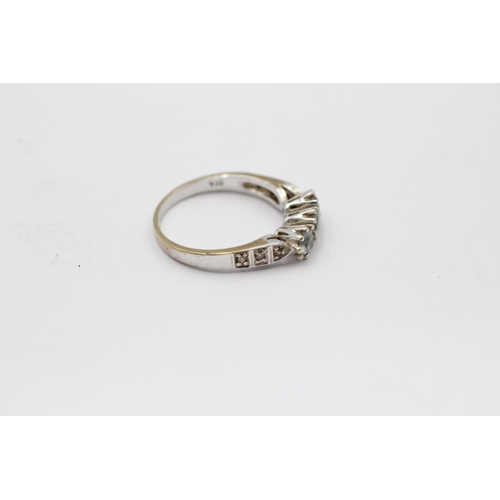 2316 - A hallmarked Sheffield 9ct white gold topaz and diamond ring, size O½ - approx. gross weight 3 grams