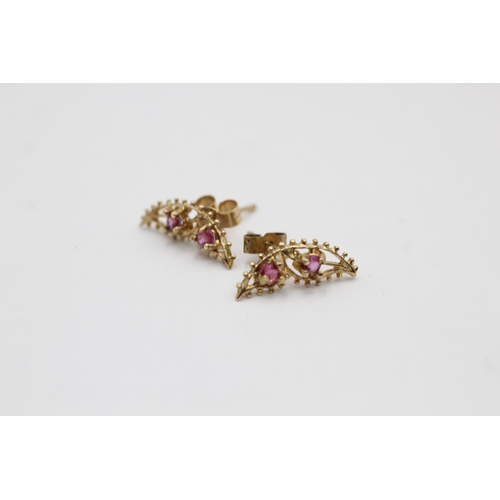 2318 - A 9ct gold ruby butterfly pendant necklace and stud earrings set - approx. gross weight 2.4 grams