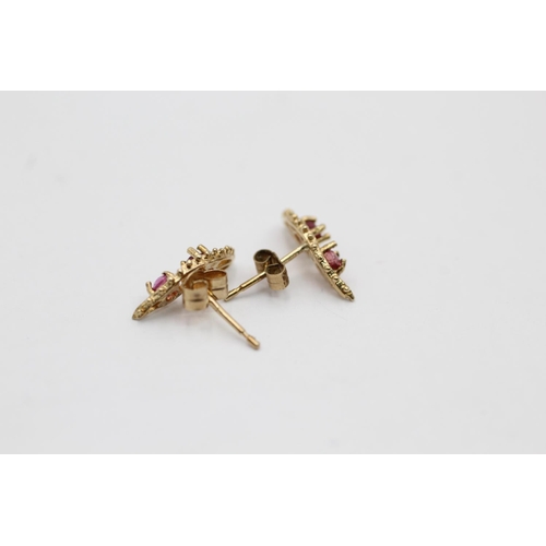 2318 - A 9ct gold ruby butterfly pendant necklace and stud earrings set - approx. gross weight 2.4 grams