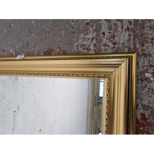 1215 - A modern rectangular wall mirror - approx. 106cm x 76cm