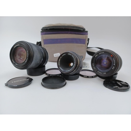 1219 - A Cullmann case containing three lenses for Pentax, one Asahi Opt.Co. Pentax-M Macro 1:4 50mm, one T... 