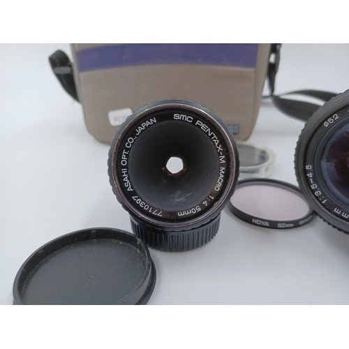 1219 - A Cullmann case containing three lenses for Pentax, one Asahi Opt.Co. Pentax-M Macro 1:4 50mm, one T... 