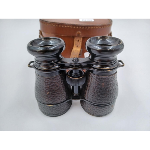 1221 - A cased pair of Colmont Serie Veco binoculars