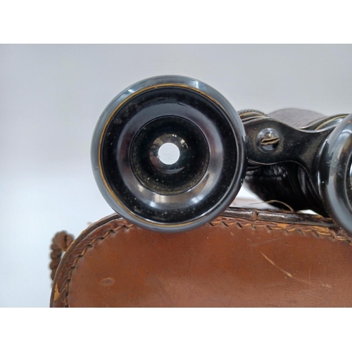 1221 - A cased pair of Colmont Serie Veco binoculars