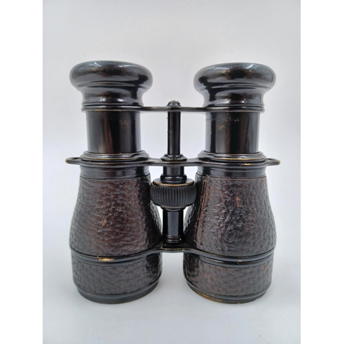 1221 - A cased pair of Colmont Serie Veco binoculars