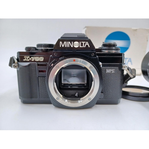 1222 - Two Minolta items, one boxed X-700 35mm SLR camera and one MC Tele Rokkor-PF 1:2.8 f=135mm lens