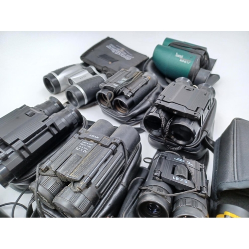 1223 - A collection of pocket binoculars to include Summit 10 x 26, 4 x 30, 8 x 21, Starlux 8 x 22, Ranger ... 