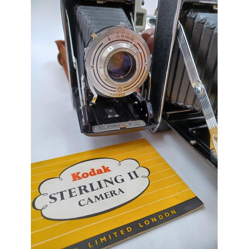 1225 - Five Kodak cameras, one cased late 1950s Sterling II folding for 620 film with instruction manual, o... 