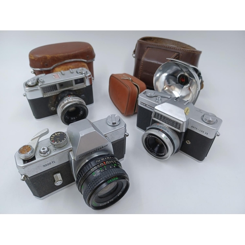 1227 - Three Japanese 35mm cameras, one Mamiya/Sekor 1000TL SLR fitted with Sirius MC 1:2.8 f=28mm lens, on... 