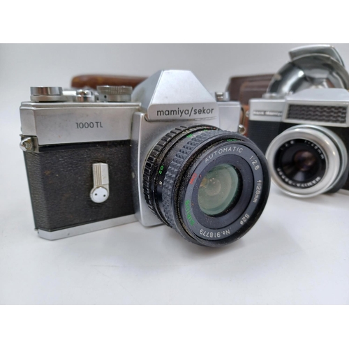 1227 - Three Japanese 35mm cameras, one Mamiya/Sekor 1000TL SLR fitted with Sirius MC 1:2.8 f=28mm lens, on... 