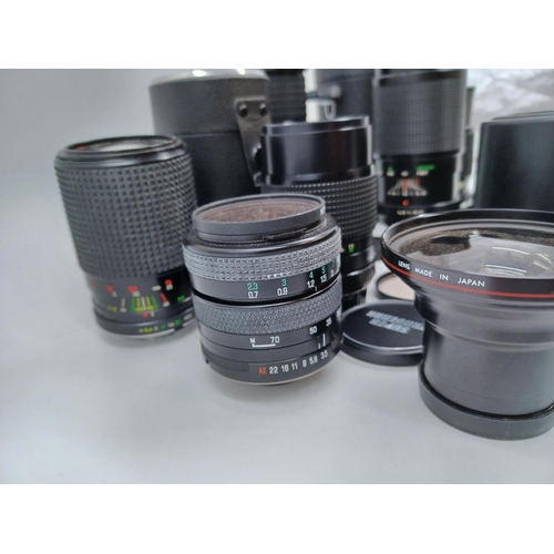 1231 - A large collection of lenses to include cased Super Ozeck auto zoom MC 1:3.8 f=75-150mm, cased Super... 