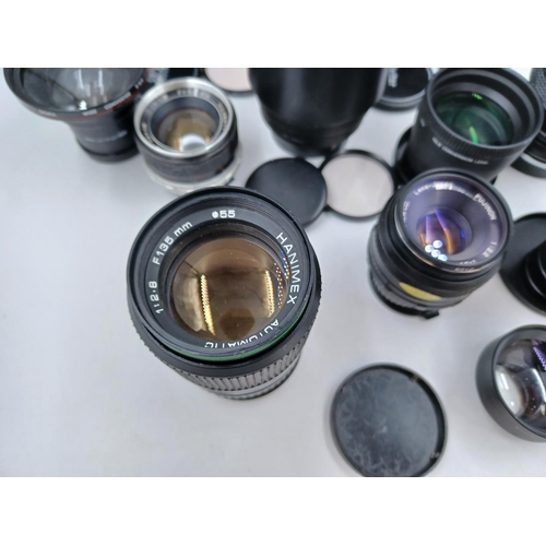 1231 - A large collection of lenses to include cased Super Ozeck auto zoom MC 1:3.8 f=75-150mm, cased Super... 