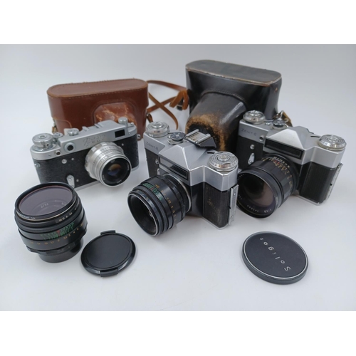 1232 - Four items, one cased FED 2 35mm rangefinder camera, one Helios-44-2 2/58 lens, one cased KMZ Zenit ... 