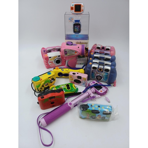 1235 - A collection of children's cameras to include Vtech Kidizoom and Fisher Price etc.