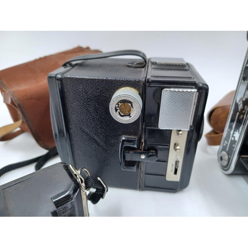 1238 - Four Coronet cameras, one cased folding for 120 film, one bakelite Victor viewfinder for 127 film, o... 