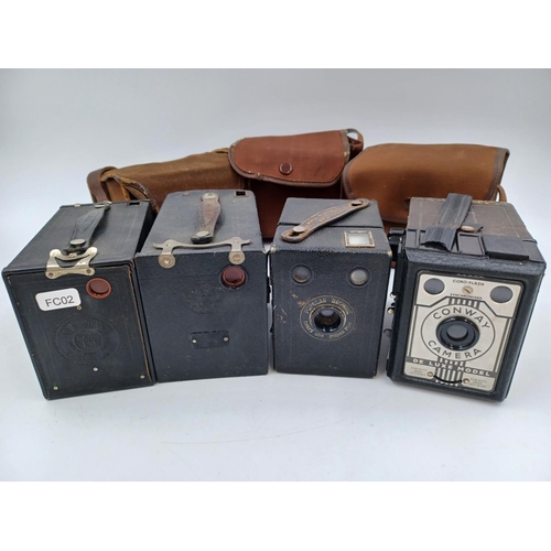 1240 - Four box cameras, one Canadian Kodak No.2 Brownie for 120 film, one British Kodak No.2 Brownie for 1... 