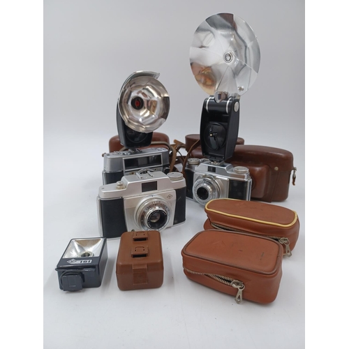 1241 - A collection of cased Agfa items to include Optima 35mm camera, two Silette 35mm viewfinder cameras ... 