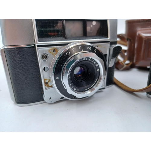 1241 - A collection of cased Agfa items to include Optima 35mm camera, two Silette 35mm viewfinder cameras ... 