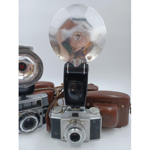 1241 - A collection of cased Agfa items to include Optima 35mm camera, two Silette 35mm viewfinder cameras ... 