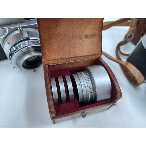 1242 - Five cameras, one mid 20th century Italian C.M.F. Bencini Comet S for 127 film, one Dacora-Matic 4D ... 