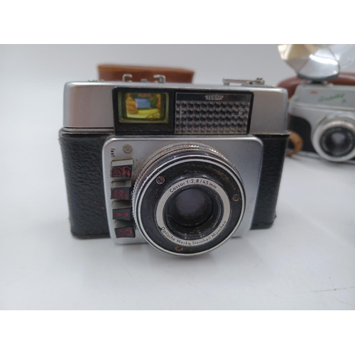 1242 - Five cameras, one mid 20th century Italian C.M.F. Bencini Comet S for 127 film, one Dacora-Matic 4D ... 