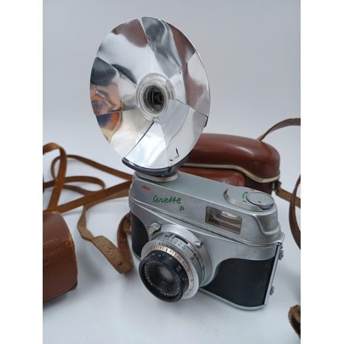 1242 - Five cameras, one mid 20th century Italian C.M.F. Bencini Comet S for 127 film, one Dacora-Matic 4D ... 