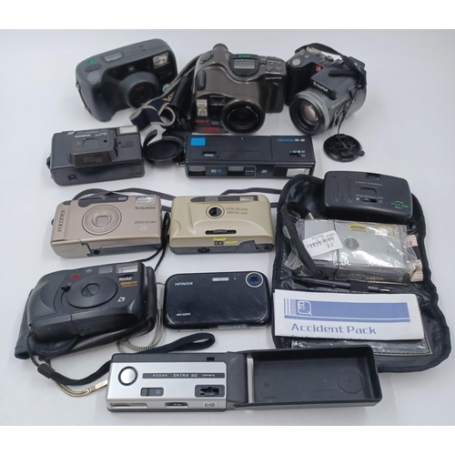 1246 - A collection of cameras to include Fujifilm FinePix 6900Z digital, Olympus AZ-330 Super Zoom 35mm po... 