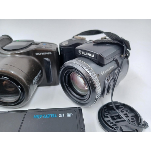 1246 - A collection of cameras to include Fujifilm FinePix 6900Z digital, Olympus AZ-330 Super Zoom 35mm po... 