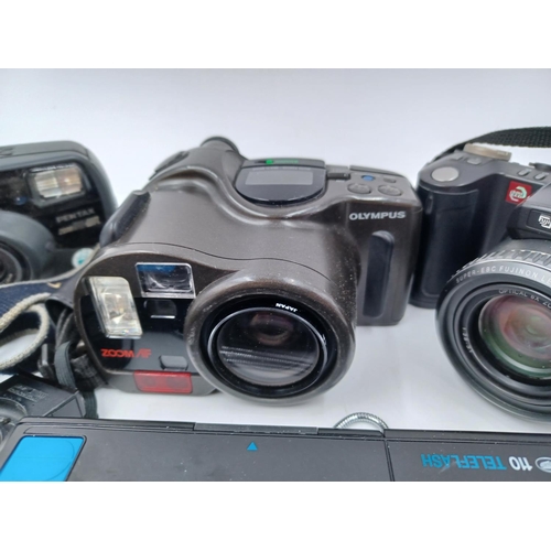 1246 - A collection of cameras to include Fujifilm FinePix 6900Z digital, Olympus AZ-330 Super Zoom 35mm po... 