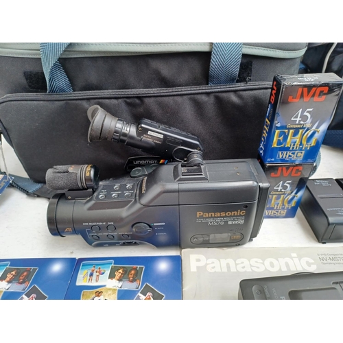 1250 - Two cased camcorders with accessories, instruction manuals and blank media, one Panasonic MS70 and o... 