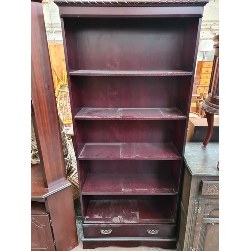 1076 - Two pieces of mahogany effect furniture, one display cabinet - approx. 199cm high x 105cm wide x 47c... 