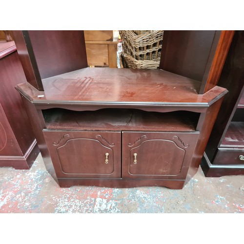 1076 - Two pieces of mahogany effect furniture, one display cabinet - approx. 199cm high x 105cm wide x 47c... 