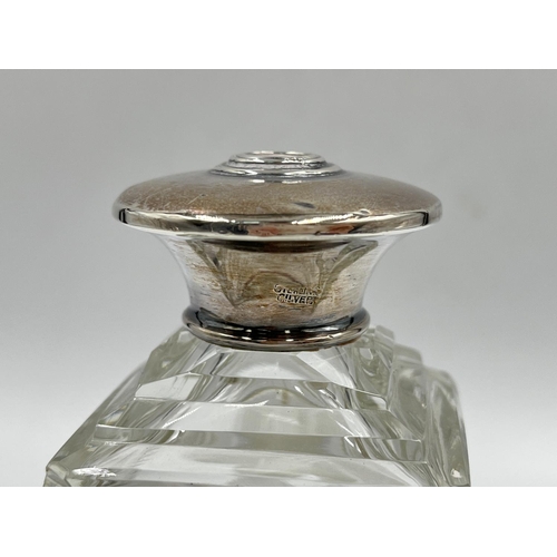 284 - Three cut glass scent bottles with sterling silver tops to include Victorian bottle, dated 1886 - ap... 