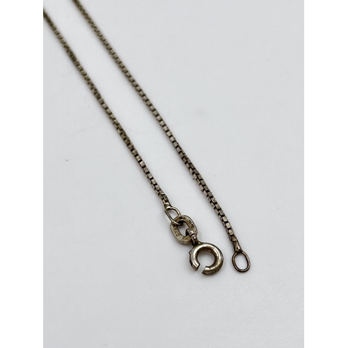 2339 - Two 925 silver necklaces, one 60cm with hallmarked London silver ingot pendant, dated 1980 and one 4... 