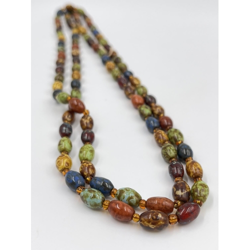 2334 - Two mid 20th century glass beaded necklaces, one Millefiori possibly by Murano and one Scottish agat... 